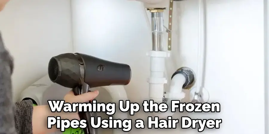 Warming Up the Frozen Pipes Using a Hair Dryer