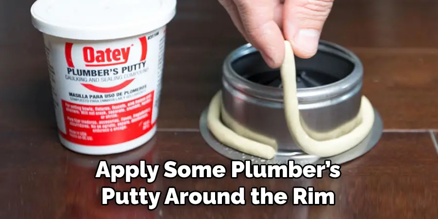 Apply Some Plumber’s Putty Around the Rim