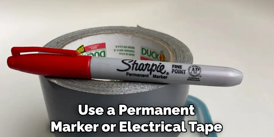 Use a Permanent Marker or Electrical Tape